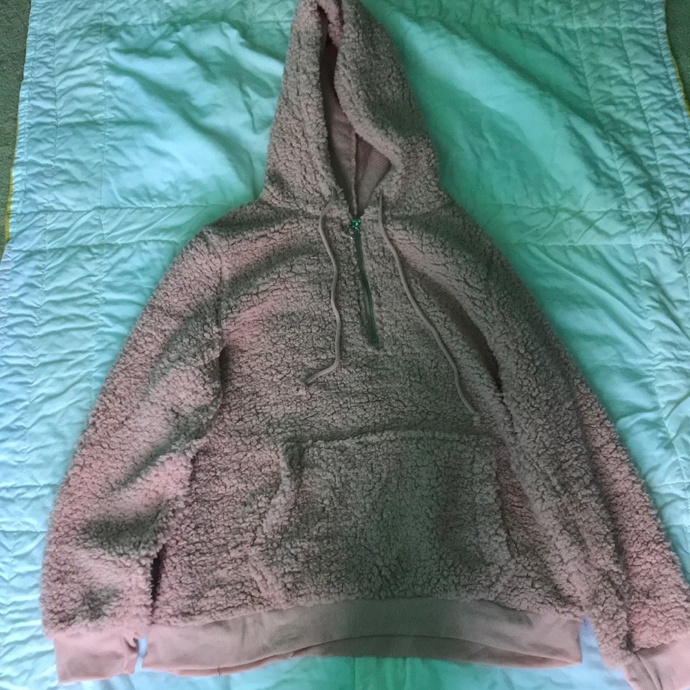 light pink fluffy sweater